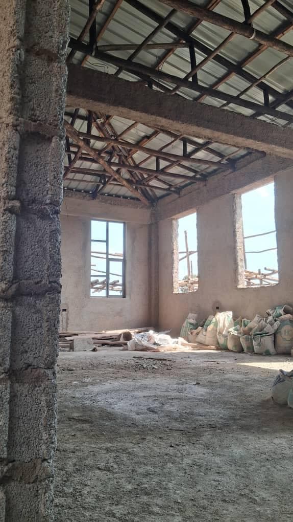 Top floor of the hospital with window openings under the roof trusses